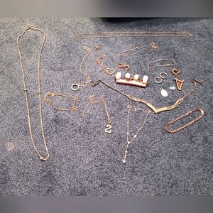 Costume jewelry bundle includes vintage wooden jewelry box.